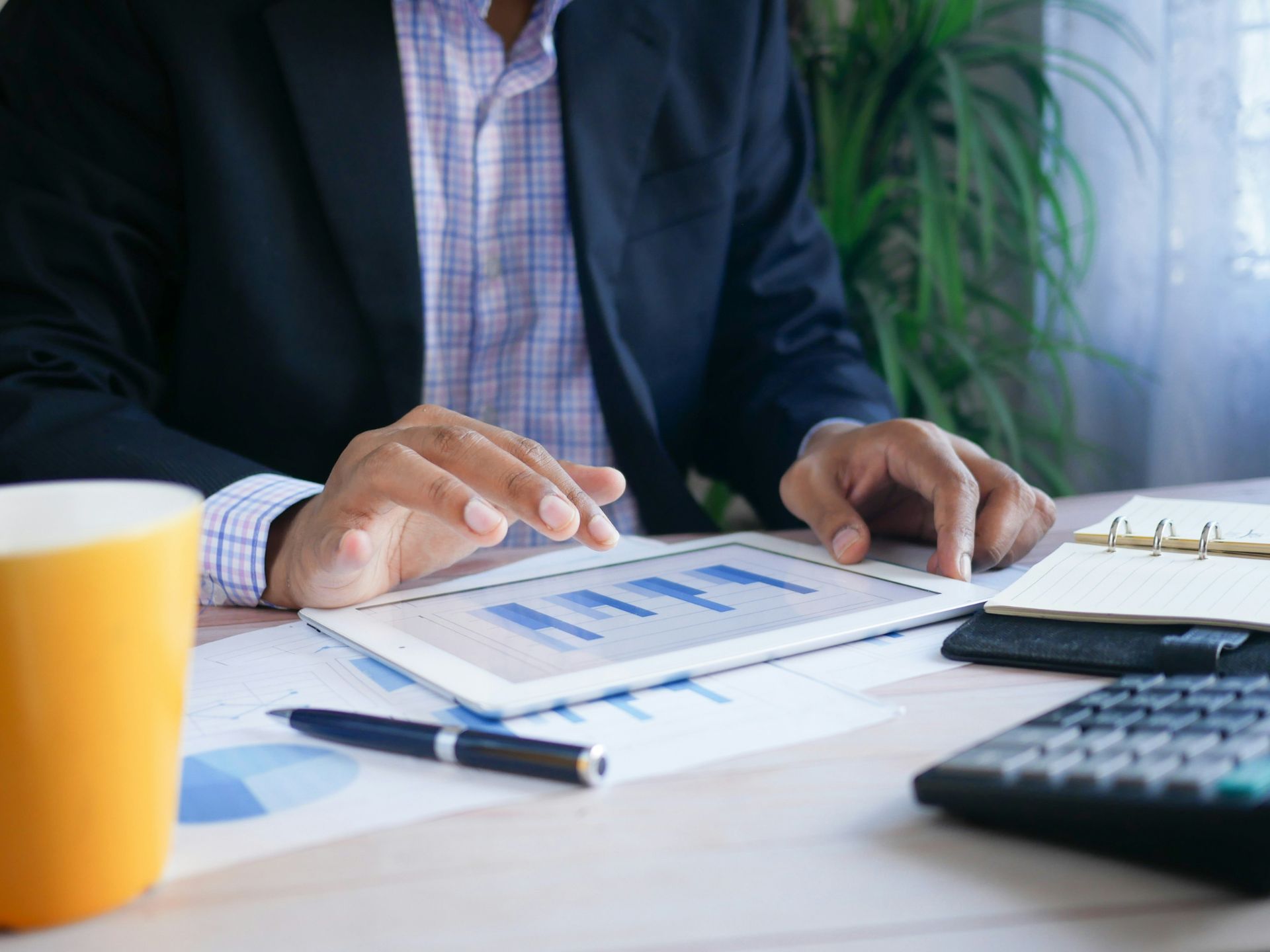 Business owner completing a mid-year financial check in Xero
