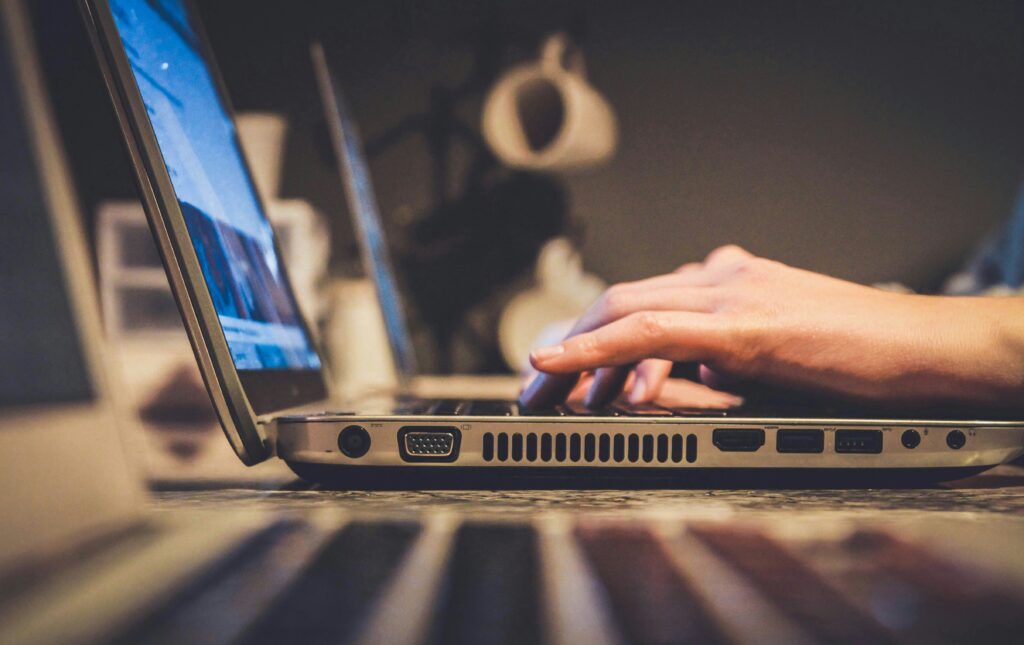 UK small business owner learning how to protect their business from online scams